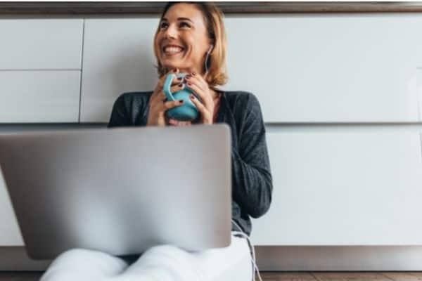 Smiling Woman with her laptop