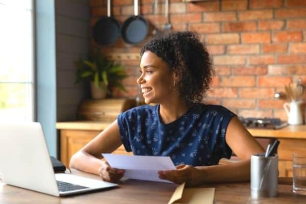 woman happy getting a certificate online 