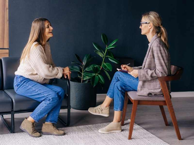 woman consultant helping a woman client with her personal service business