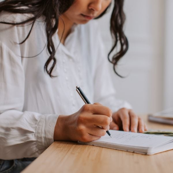 middle age woman writing