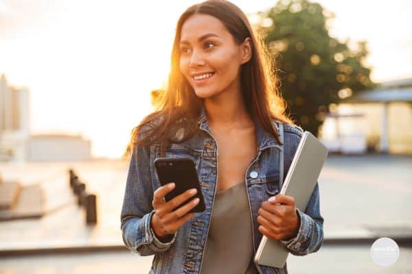 women smiling, getting outside of her comfort zone.