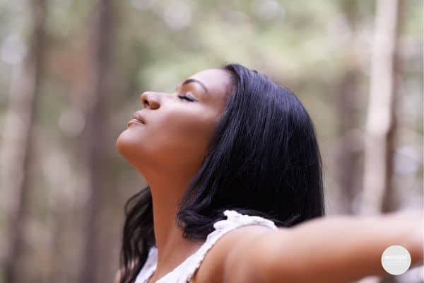 woman at peace letting go and trusting the process