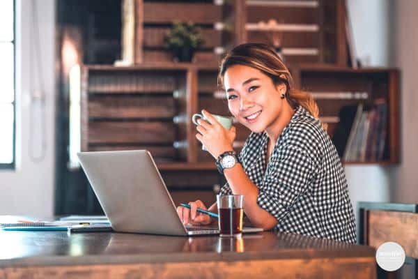 woman looking happy and peaceful at work