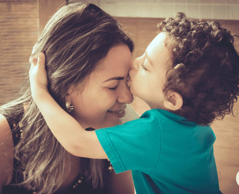 mom embracing her son on mother's day