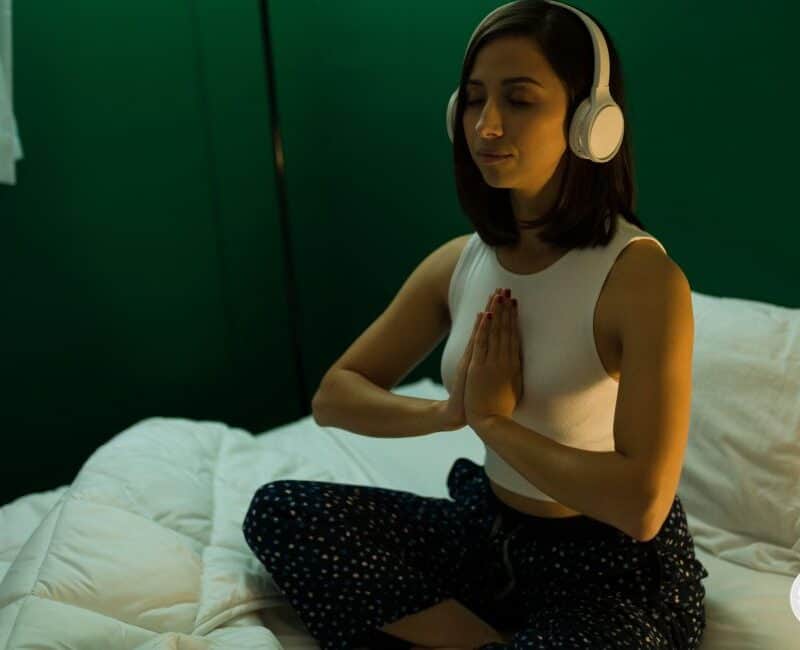 woman doing a night body scan before gong to sleep.