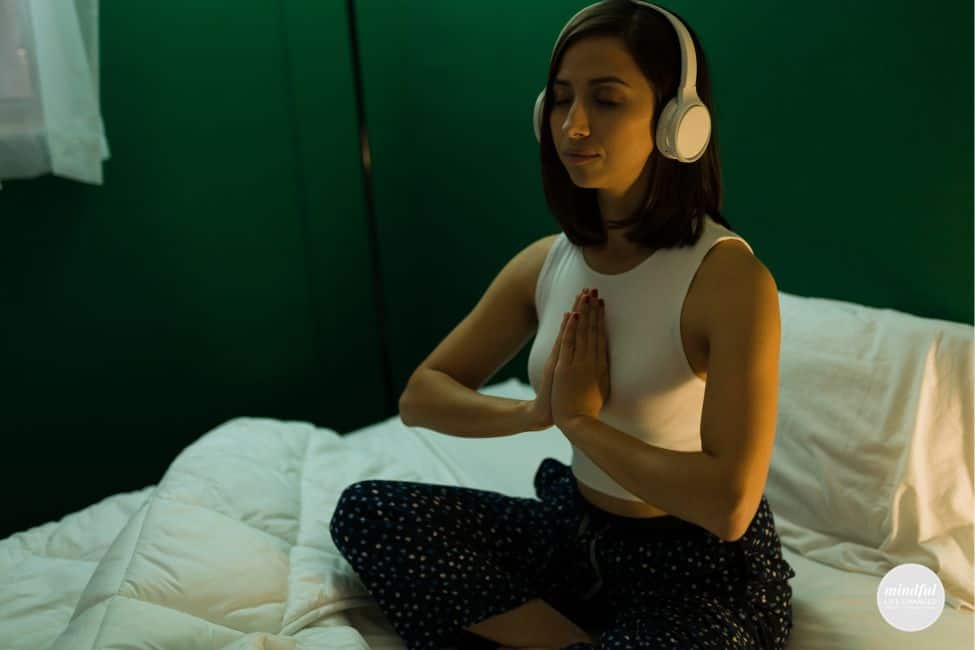 woman doing a night body scan before gong to sleep.