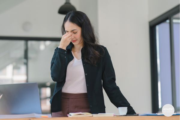 A woman who is dealing with stress in need of relief